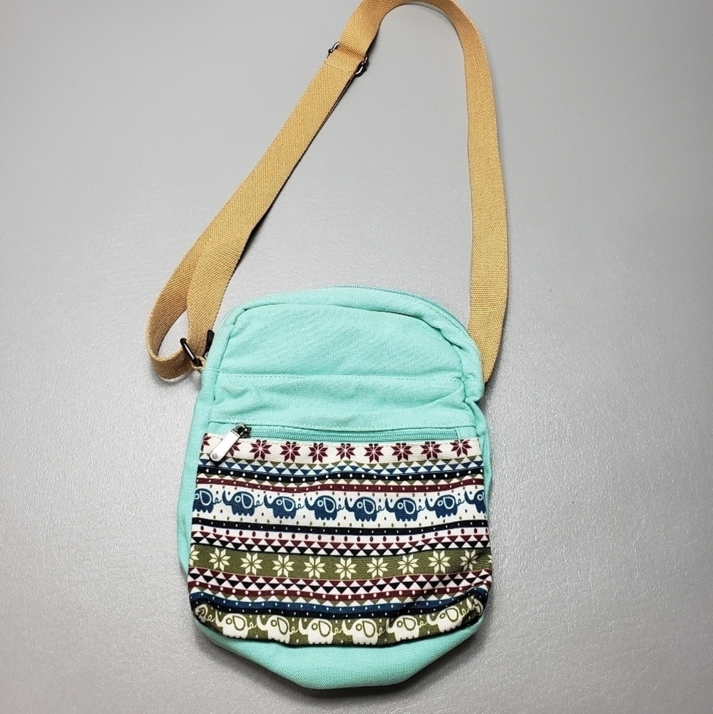 Unbranded light blue, brown crossbody elephant bag with adjustable straps
